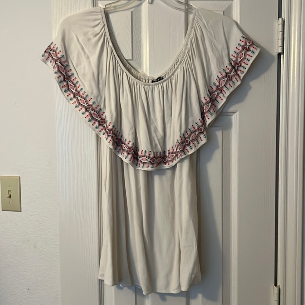 Torrid size 2. Can be worn on or off shoulder